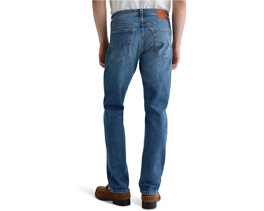 Джинсы AG Jeans Graduate Tailored Leg в цвете Ashfield из японского денима
