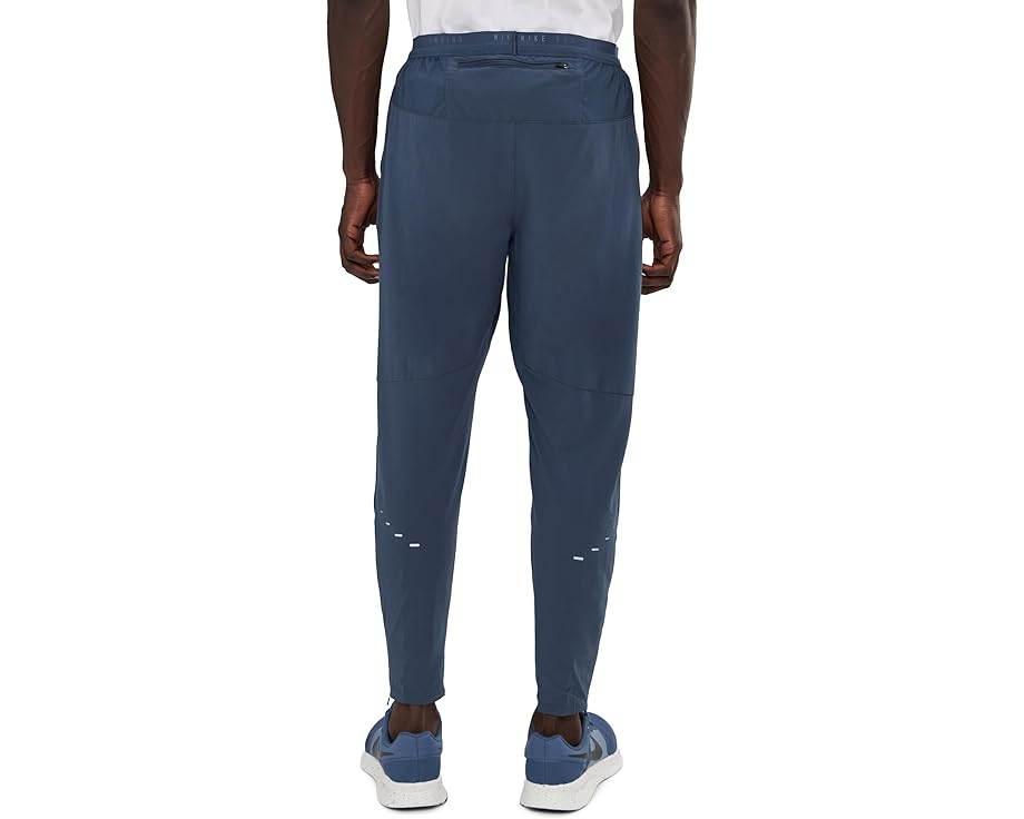 Беговые брюки Nike Stride Dri-FIT Woven с заниженной талией и водоотталкивающей отделкой
