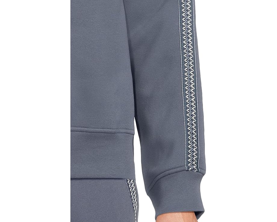 Свитшот UGG Tasman Crew Neck с тесьмой на рукавах из переработанного полиэстера