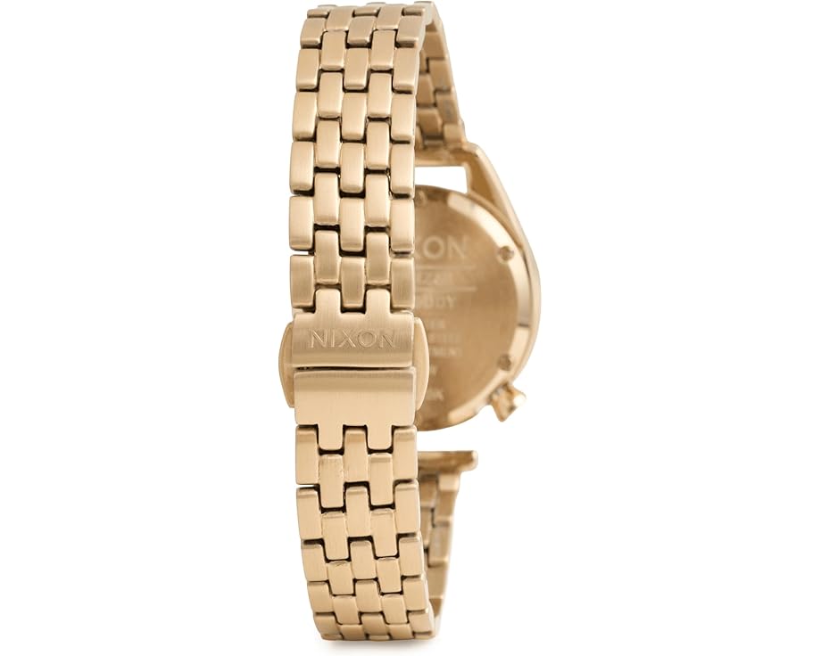 Nixon Eddy часы с позолоченным корпусом и черным циферблатом