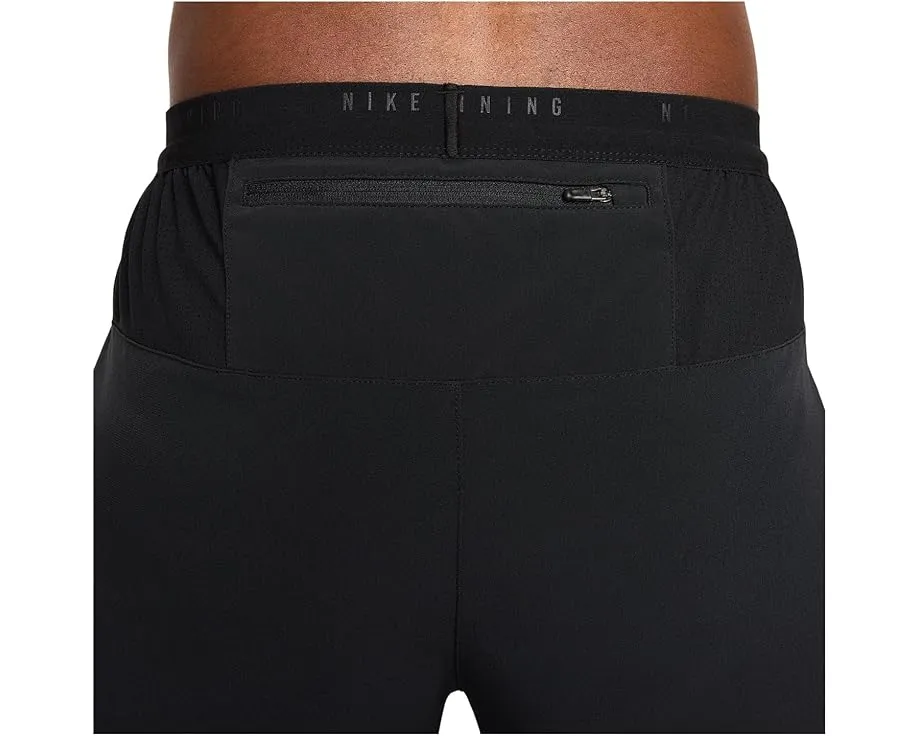 Беговые брюки Nike Stride Dri-FIT Woven с заниженной талией и водоотталкивающей отделкой