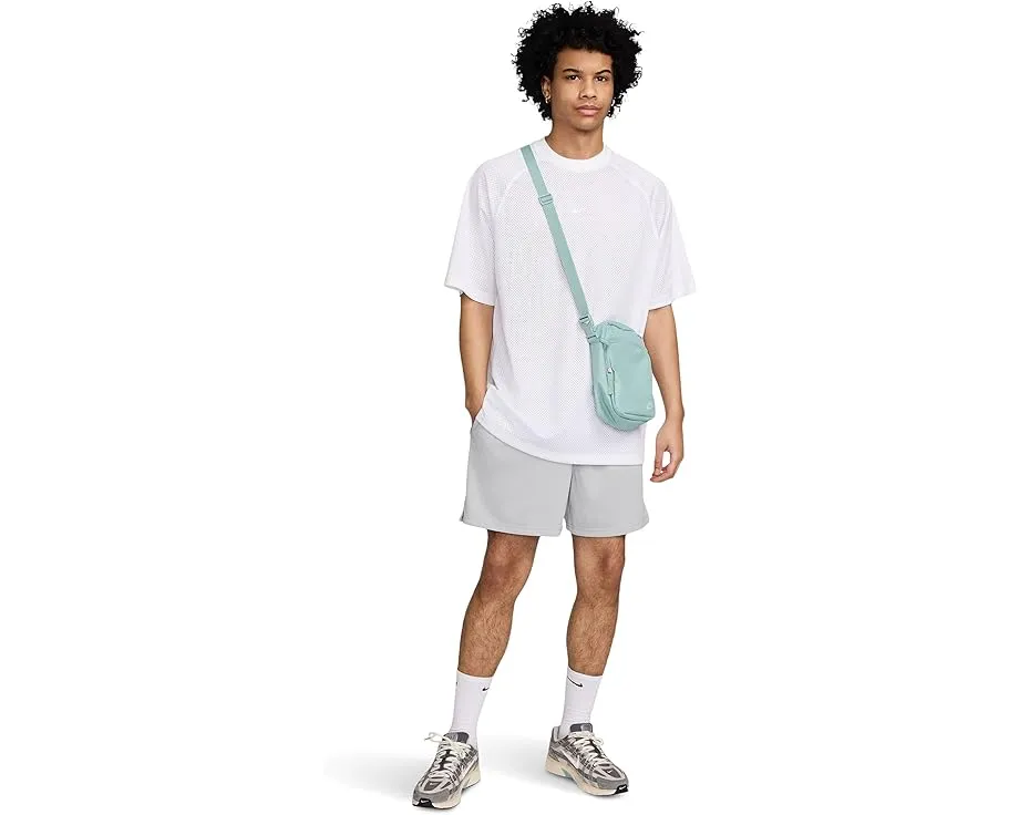 Шорты Nike Club Mesh Flow с сетчатой тканью и карманами