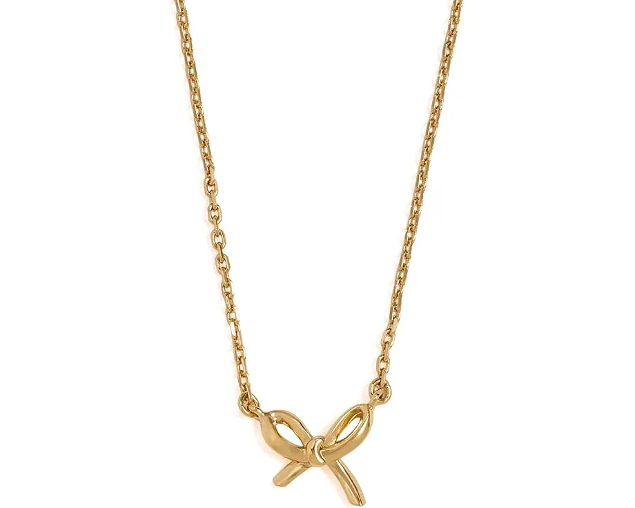 Мини-подвеска Girlie Pearlie Mini Bow Pendant от Kate Spade New York с бантиком
