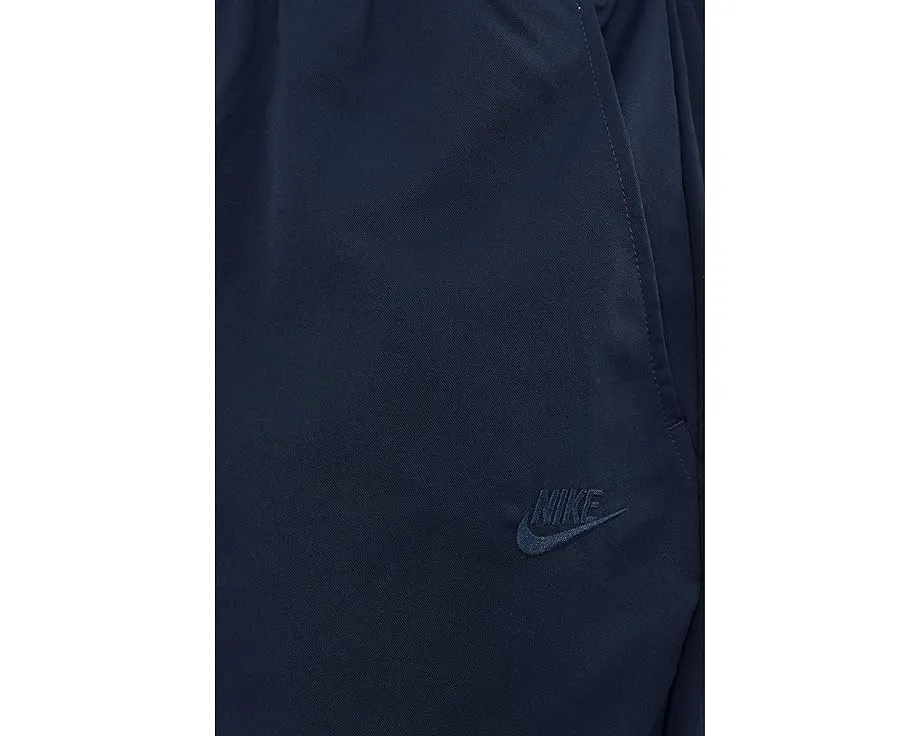 Брюки Nike Club Woven с зауженным низом для повседневной носки
