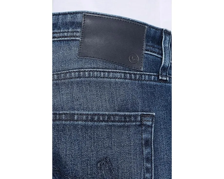 Джинсы AG Jeans Graduate Tailored Leg Negroni зауженные к низу