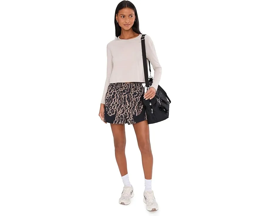 Длинная футболка Celestia от TravisMathew с круглым вырезом и расслабленным кроем