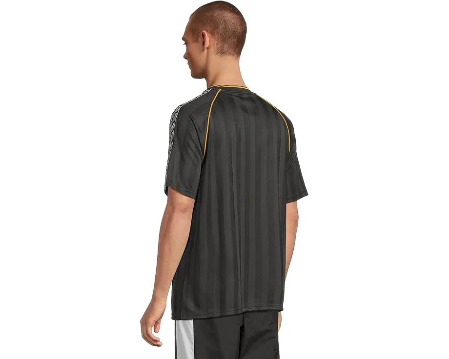 Футболка PUMA King Relaxed Soccer из переработанного полиэстера