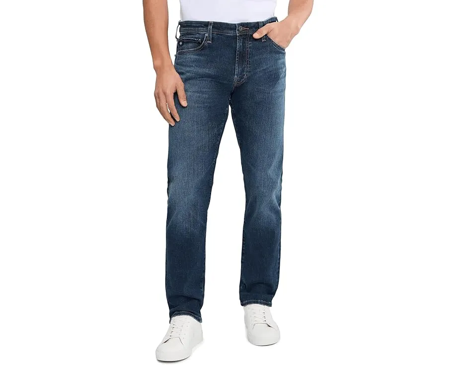 Джинсы AG Tellis Modern Slim с зауженным низом и средней посадкой