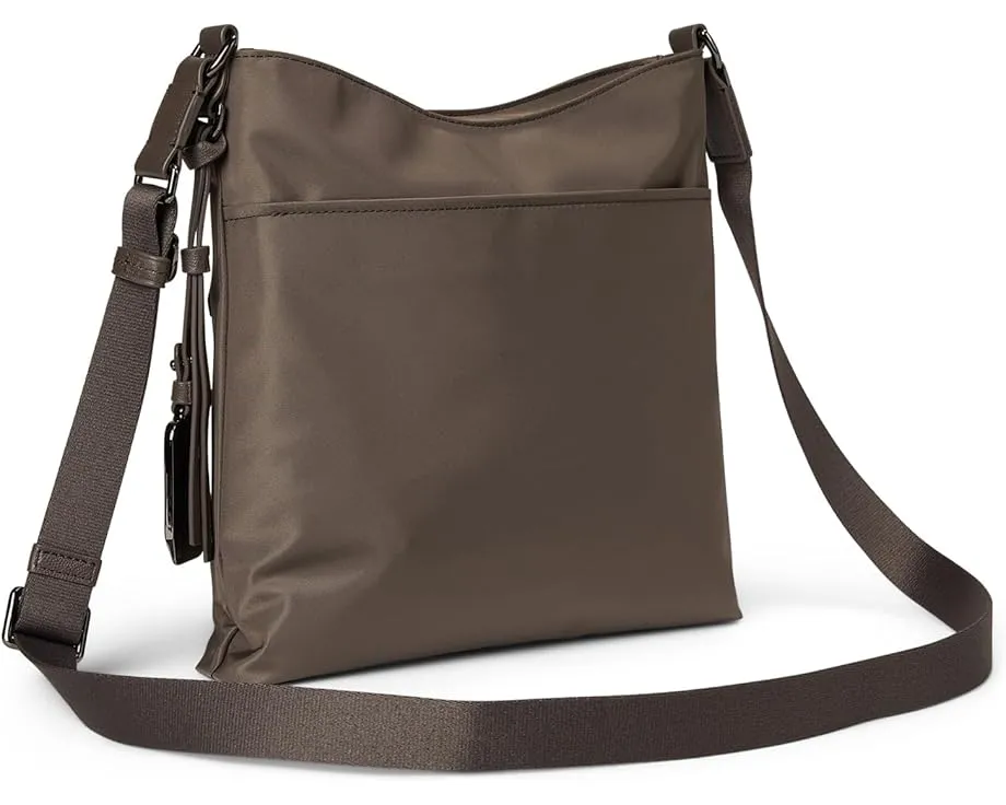 Кроссбоди Tumi Tyler с множеством карманов и съемным кожаным шармом
