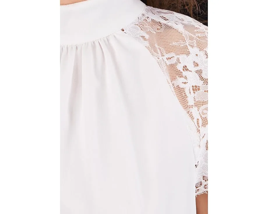 Блуза Vince Camuto с высоким воротником и кружевными вставками на рукавах