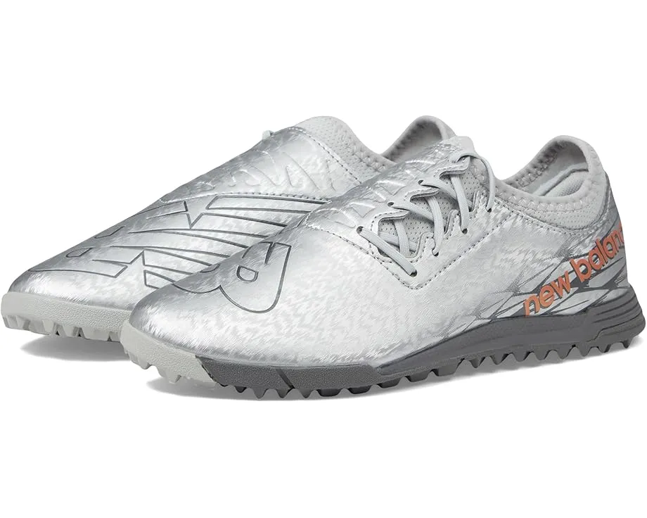 Детские бутсы New Balance Furon v7 Dispatch TF с асимметричной шнуровкой
