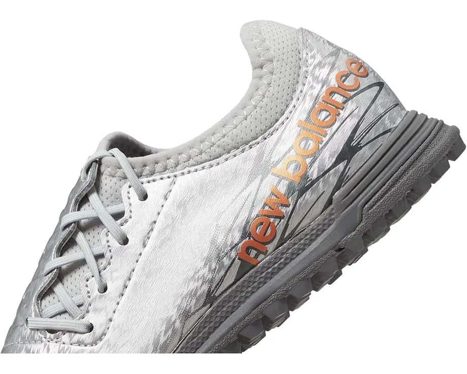 Детские бутсы New Balance Furon v7 Dispatch TF с асимметричной шнуровкой