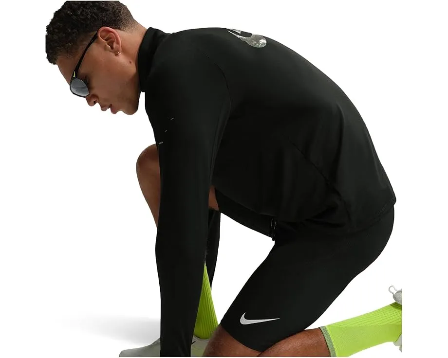 Средний слой Nike Dri-FIT Stride Reflective с технологией отвода влаги и светоотражающими элементами