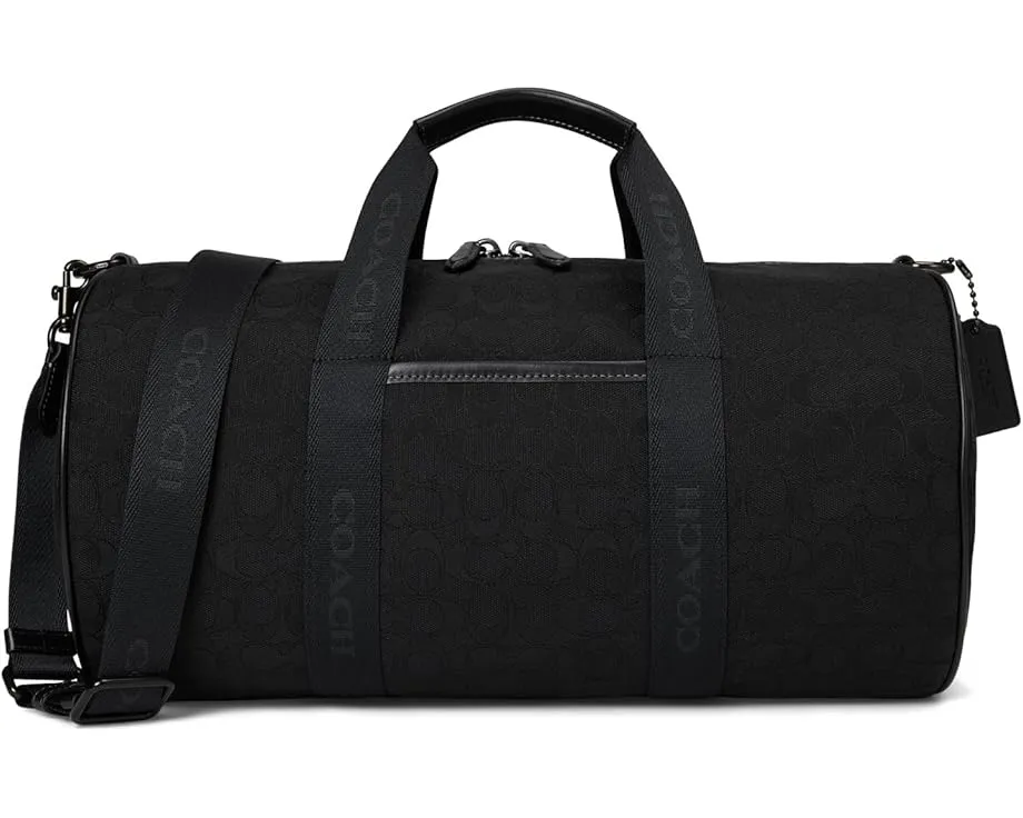Дорожная сумка COACH Theo из фирменного жаккарда с кожаными деталями