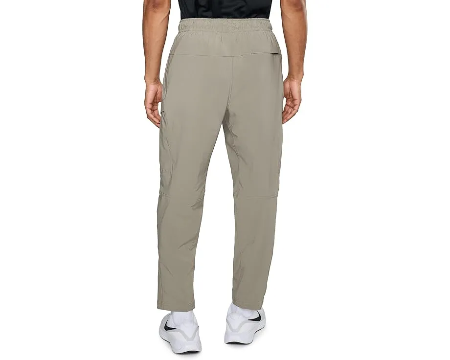 Брюки Nike Unlimited Dri-FIT Versatile Cargo с карманами и эластичным поясом