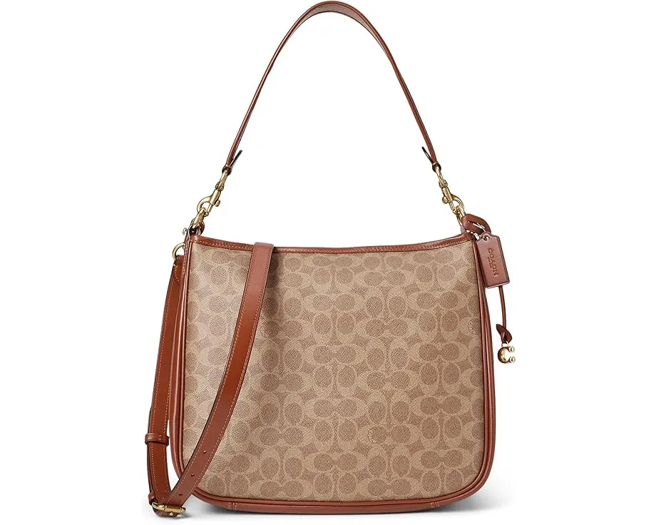Сумка через плечо COACH Signature Cary из покрытого холста и телячьей кожи