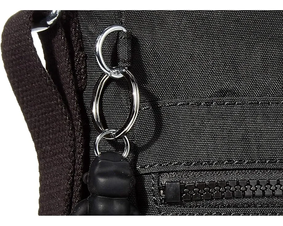 Сумка кроссбоди New Angie от Kipling с регулируемым ремнем и плоским дном