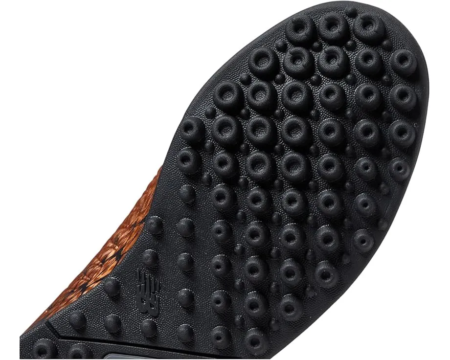 Детские футбольные бутсы New Balance Tekela v4 Magique TF с вязаным манжетом