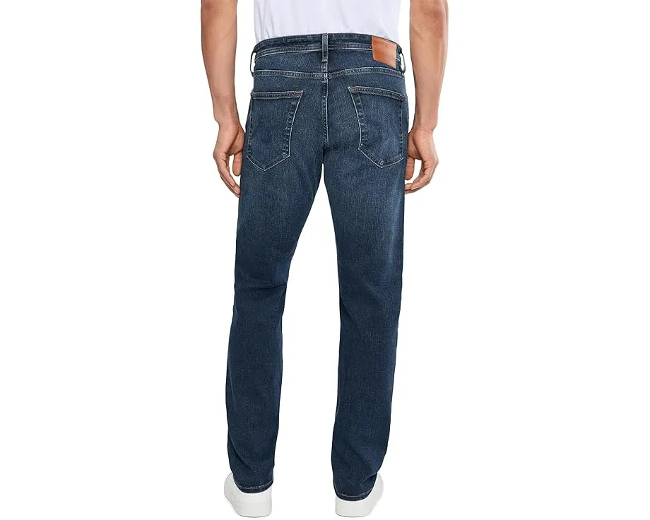 Джинсы AG Tellis Modern Slim с зауженным низом и средней посадкой