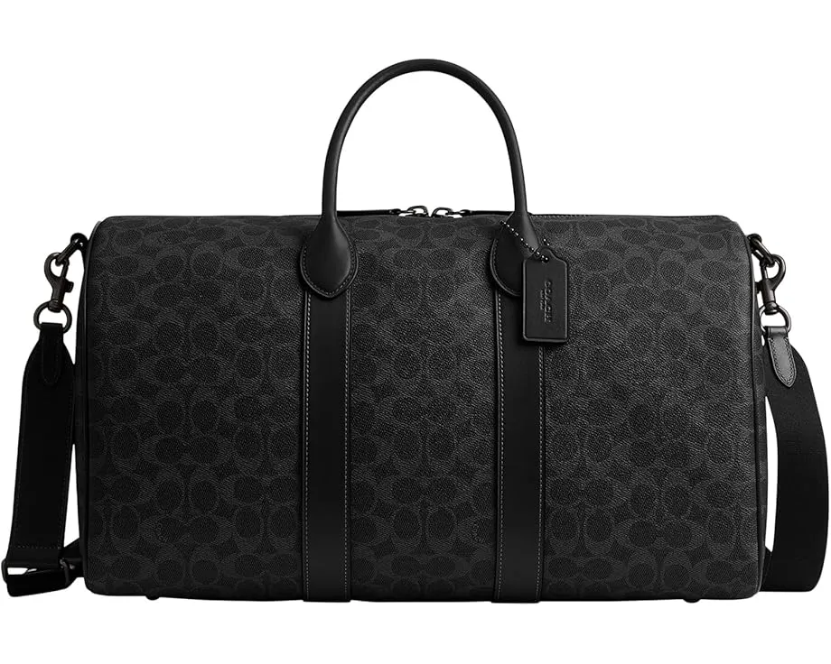 Сумка COACH Compass Bag 45 из фирменного холста с кожаными деталями и съемным ремнем