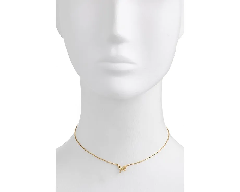 Мини-подвеска Girlie Pearlie Mini Bow Pendant от Kate Spade New York с бантиком