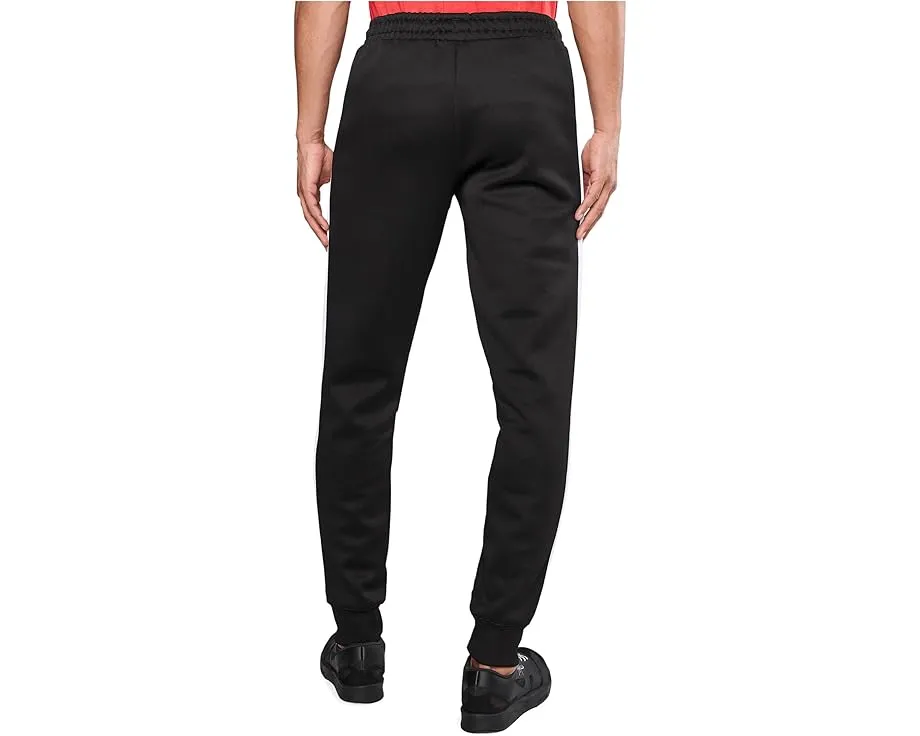 Спортивные штаны PUMA T7 Always On Track с вставками и манжетами