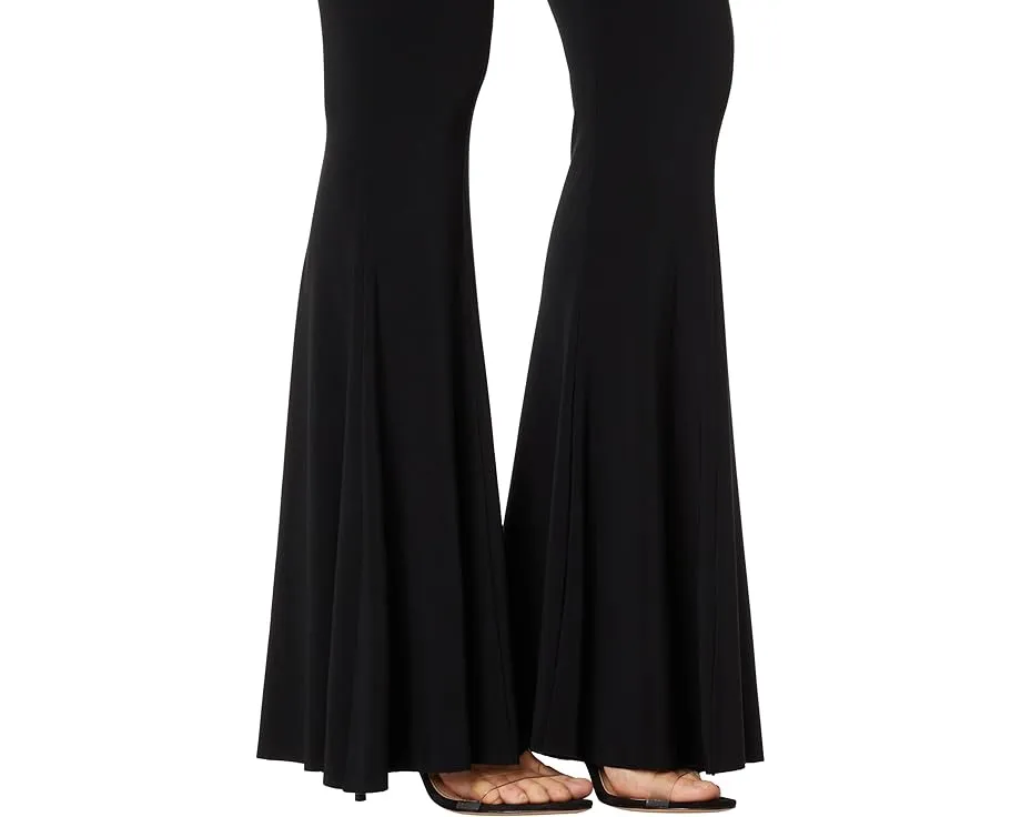 Платье Norma Kamali без рукавов с расклешенным силуэтом и карманами