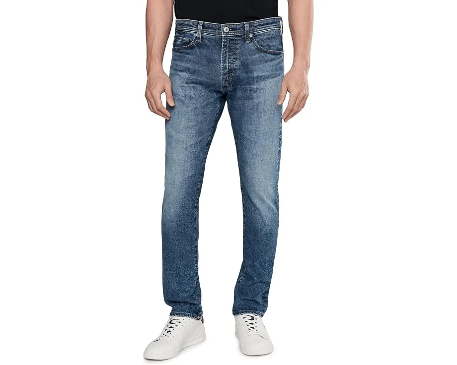 Джинсы AG Tellis Modern Slim Horsetail с эффектом потертостей