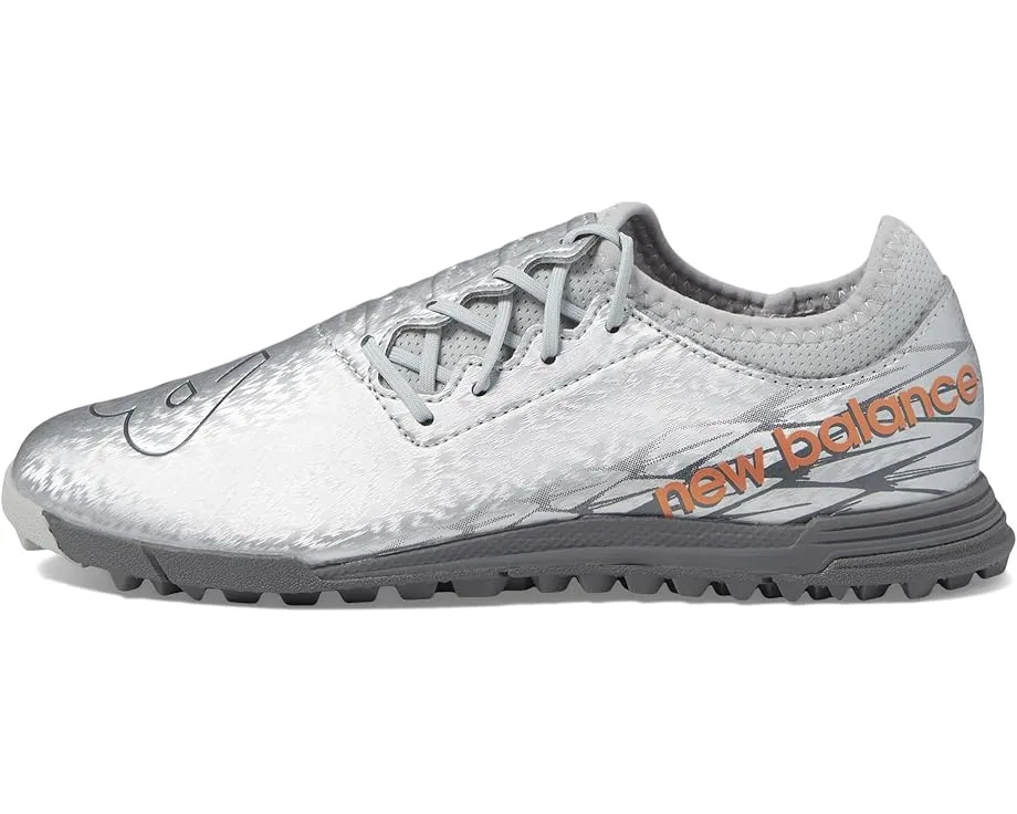 Детские бутсы New Balance Furon v7 Dispatch TF с асимметричной шнуровкой