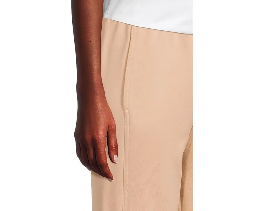 Спортивные штаны adidas by Stella McCartney из органического хлопка с манжетами