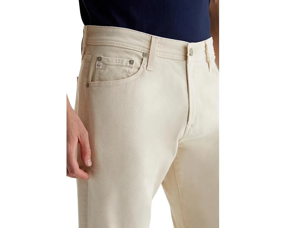 Джинсы Everett Slim Straight от AG Jeans зауженные к низу в цвете слоновая кость