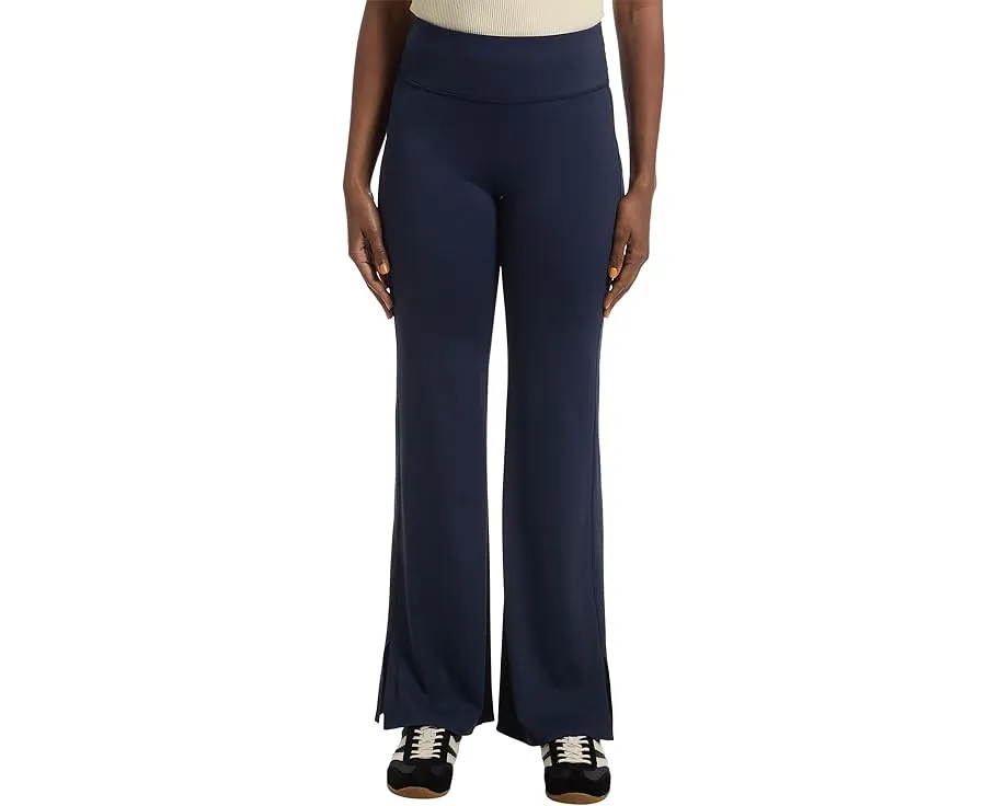 Брюки Moveknit Bonded Pants от TravisMathew с расклешенным низом и высокой талией