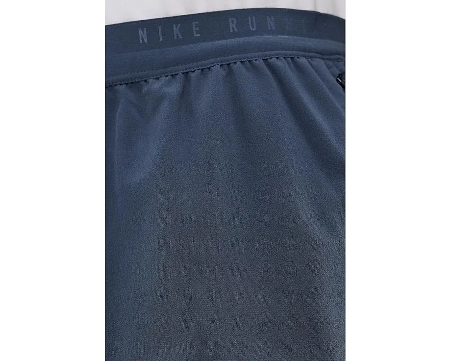 Беговые брюки Nike Stride Dri-FIT Woven с заниженной талией и водоотталкивающей отделкой