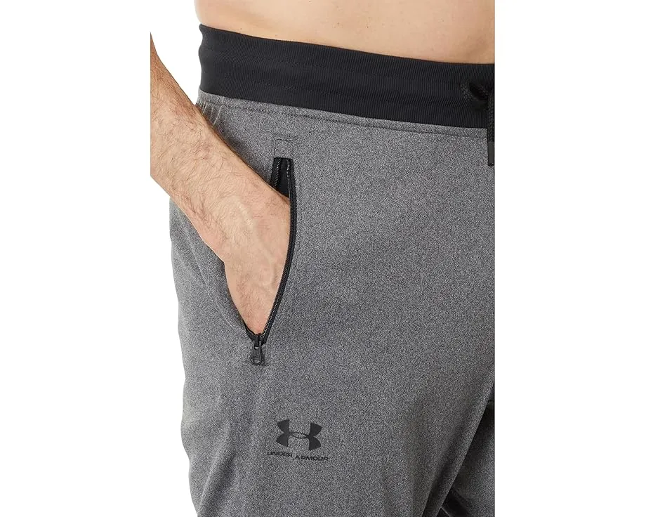 Under Armour Спортивные брюки джоггеры с карманами и влагоотводящей тканью