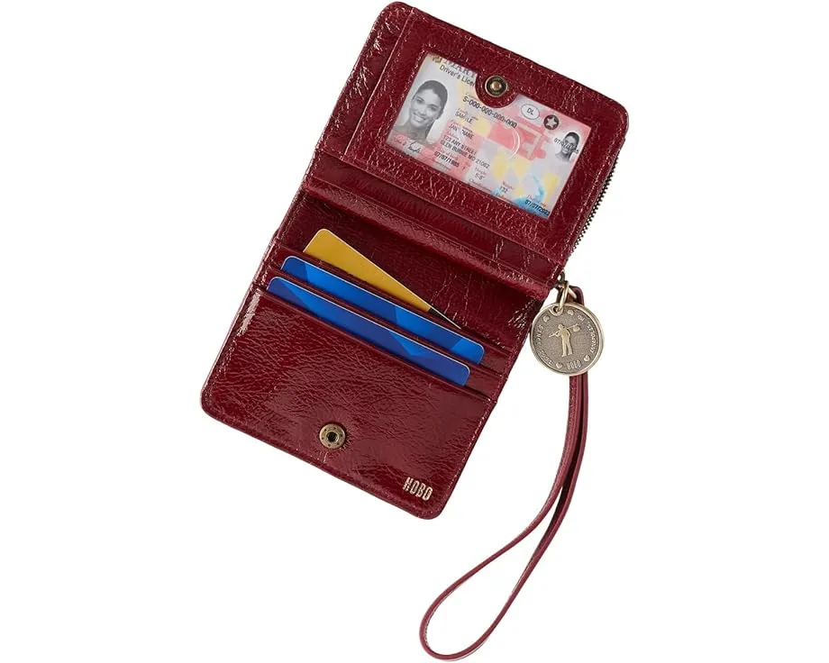 Кошелек на запястье HOBO Coin с символическим медальоном