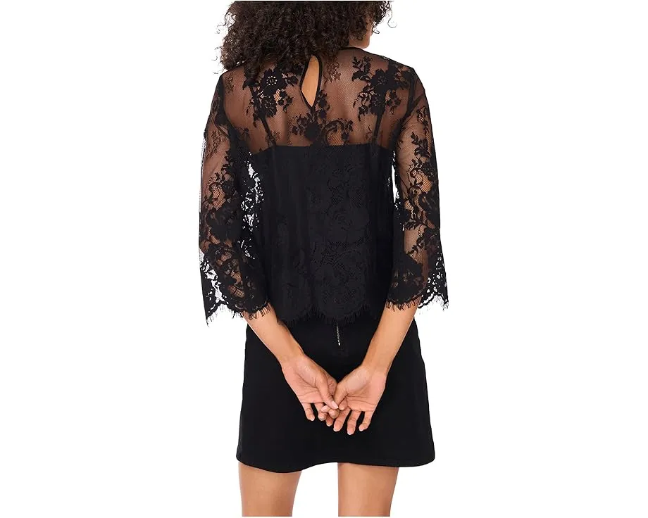 Блузка Vince Camuto с круглым вырезом и фигурным подолом