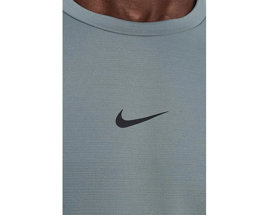 Nike Pro Top Warm лонгслив из френч терри с технологией Dri-FIT