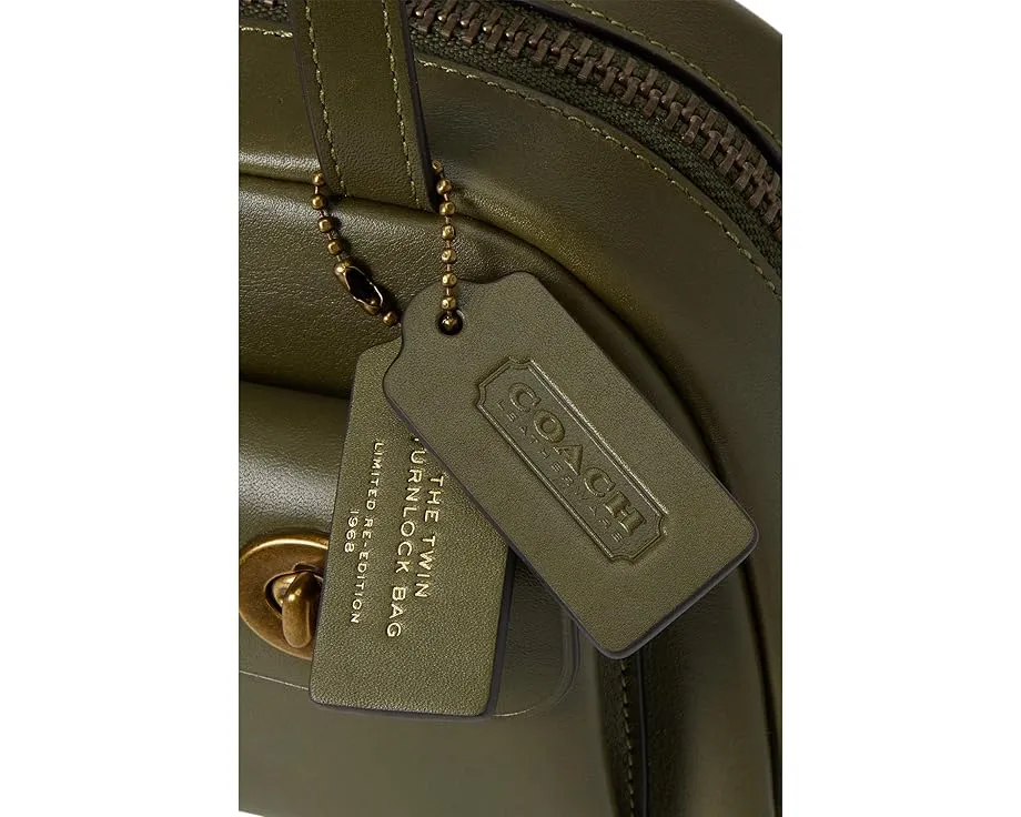 Сумка COACH Twin Turnlock Bag 20 из вощеной кожи с двумя замками