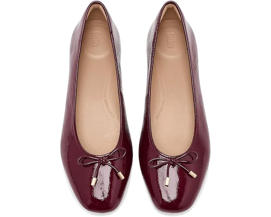 Балетки FitFlop Delicato Bow из лакированной кожи с бантом