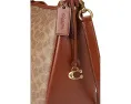 Сумка через плечо COACH Signature Cary из покрытого холста и телячьей кожи