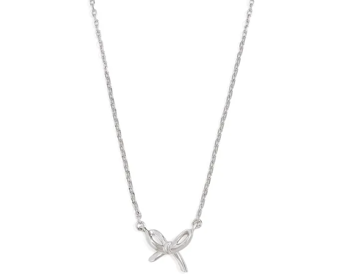 Мини-подвеска Girlie Pearlie Mini Bow Pendant от Kate Spade New York с бантиком