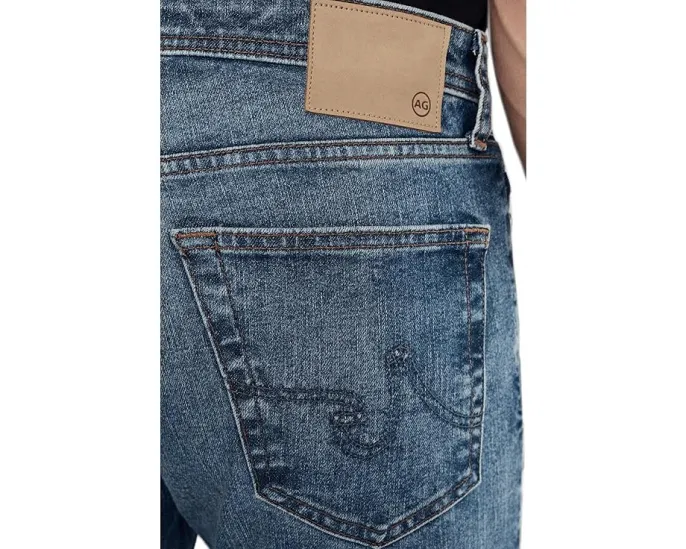 Джинсы AG Tellis Modern Slim Horsetail с эффектом потертостей