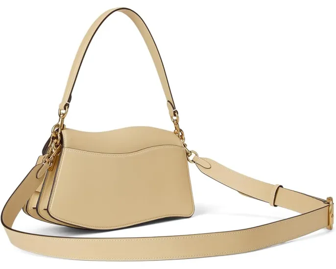 Сумка через плечо COACH Twisted Tabby с замком-твистером