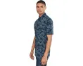 Поло TravisMathew Comfortknit Breeze с цветочным принтом