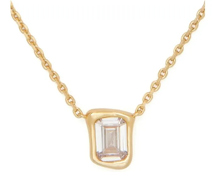 Кулон Interlock из латуни с цирконами от Kate Spade New York