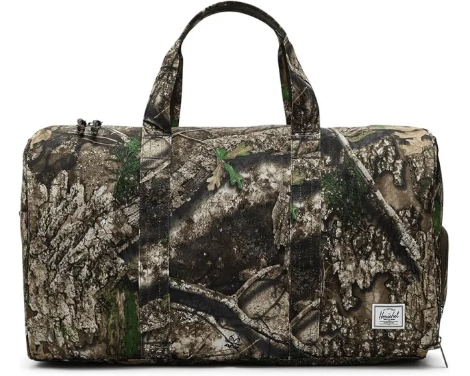 Дорожная сумка Herschel Supply Co. Realtree Herschel Novel с камуфляжным принтом