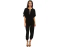 Norma Kamali Спортивный комбинезон Rectangle Jog с V-образным вырезом и короткими рукавами