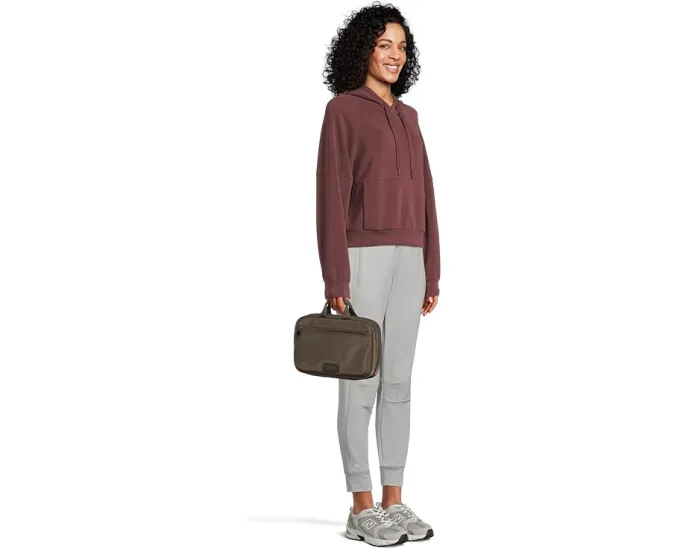 Дорожная косметичка Tumi Madeline с прозрачными карманами и крючком