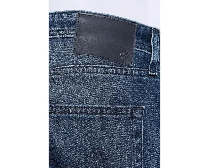 Джинсы AG Jeans Graduate Tailored Leg Negroni зауженные к низу