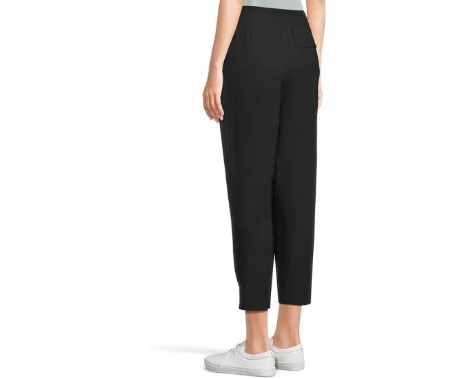 Брюки Moontide Pants от TravisMathew с зауженным силуэтом и эластичным поясом